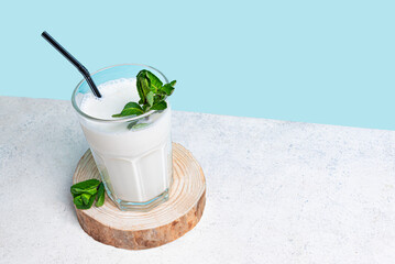Glass of probiotic fermented dairy drink. Ayran, kefir.