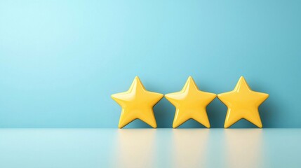 Obraz premium Three Bright Yellow Stars with Blue Background for Minimalist Design