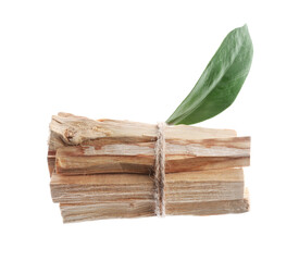 Palo santo sticks and green leaves on white background