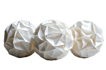 Three unique, crumpled white paper spheres arranged artistically on a clean, isolated background.