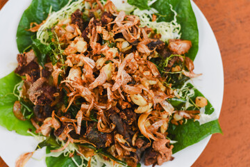 Fried frog with garlic on a plate