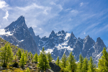 Aiguilles de Chamonix rocky granite mountain peaks in french Alps around Mont Blanc summit in Chamonix valley. Scenic landscape of iconic alpine summits the legends of mountaineering and alpinism