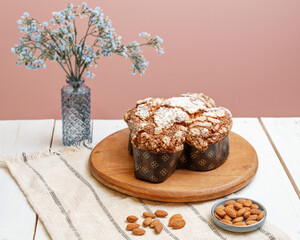 Colomba - Italian traditional Easter bread is topped with pearl sugar and almonds in the shape of a dove. Festive pastries are traditional in Italy.
