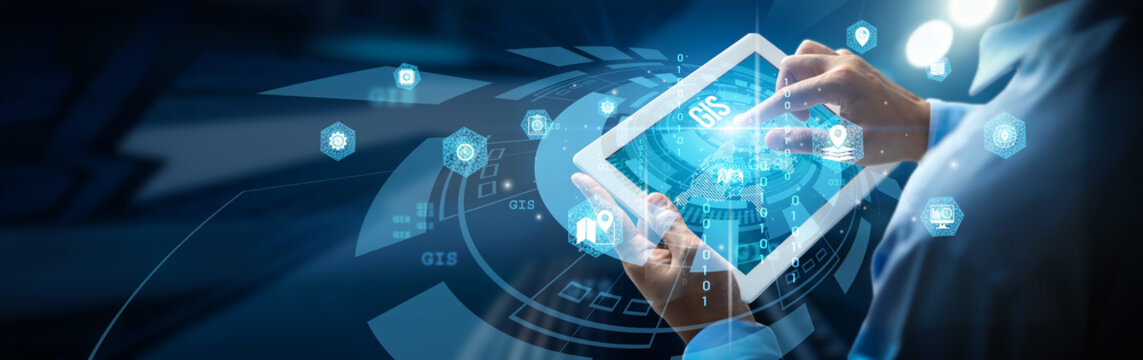 A person is using a mobile digital interface, highlighting Geographic Information System (GIS) mapping, spatial analysis, geodatabase management, location-based services, and real-time tracking.