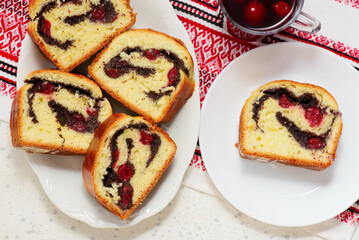 Yeast roll with poppy seeds and cherrie.top veiw