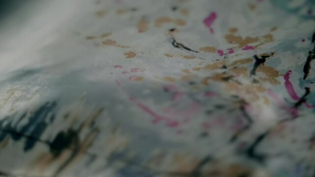 Fabric with beautiful colorful flora patterns flutters in the wind. Closeup. Macro. Slow mo, slow motion, high speed camera, 200fps