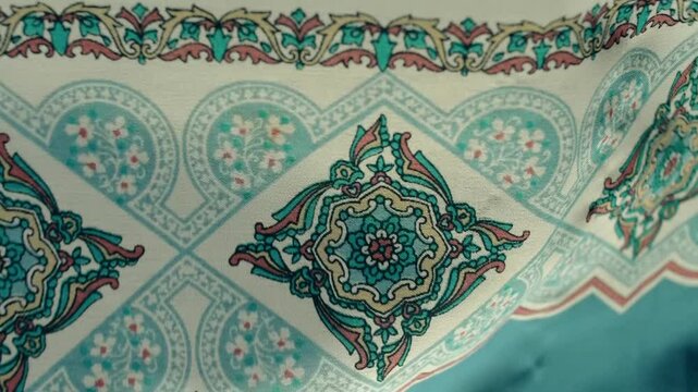 Fabric with beautiful geometric patterns flutters in the wind. Closeup. Macro. Slow mo, slow motion, high speed camera, 200fps