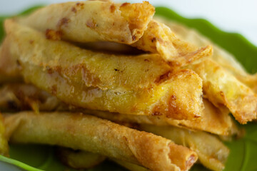 fried roll with caramel banana filling inside