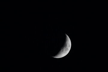 Beautiful new moon on a black background wallpaper. Beautiful new moon in a dark night. Moon wallpaper. Moon background. Turkish luna

