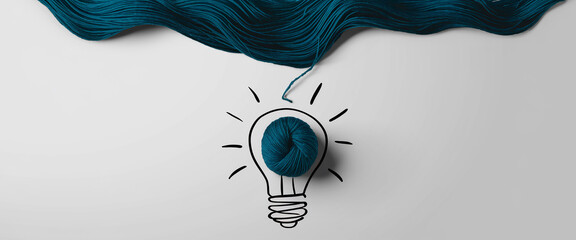 Teal yarn forms a wave above a drawn lightbulb containing a teal yarn ball, symbolizing creative inspiration and innovative ideas in crafting or design