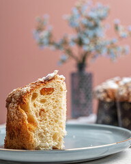 Colomba - Italian traditional Easter bread is topped with pearl sugar and almonds in the shape of a dove. Festive pastries are traditional in Italy.