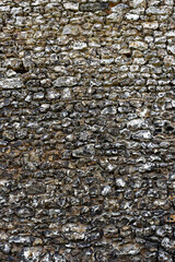 Stein Mauer aus behauenen Feuersteinen