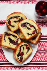 Yeast roll with poppy seeds and cherrie.top veiw