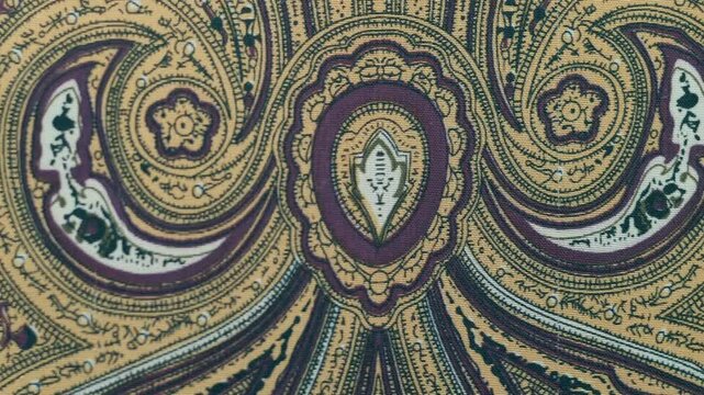 Fabric with beautiful asian patterns flutters in the wind. Closeup. Macro. Slow mo, slow motion, high speed camera, 200fps