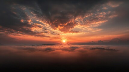 Fototapeta premium Majestic Sunrise Over the Misty Horizon with Vibrant Sky Colors