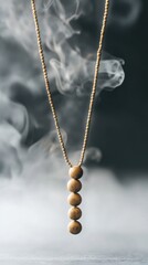 Mystical wooden bead necklace hanging with smoke in the background