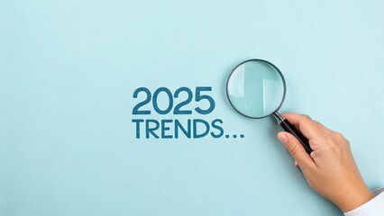 Future Trends Under Magnification: Exploring the evolving landscape of 2025, symbolized through a magnifying glass, unveiling the anticipated trends
