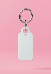 Blank keychain tag on soft pink background for personalization and branding opportunities