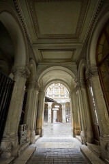Arch of the old house. Old house  in Budapest, Hungary with sculptural decorations.