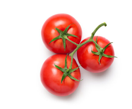 Top view of Fresh three tomatoes isolated on white background.