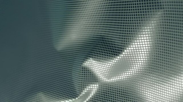 Fabric with a shiny checkered pattern flutters in the wind. Closeup. Macro. Closeup. Macro. Slow mo, slow motion, high speed camera, 200fps
