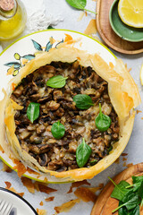 Filo pastry tart with mushrooms, cheese, and spinach .top veiw