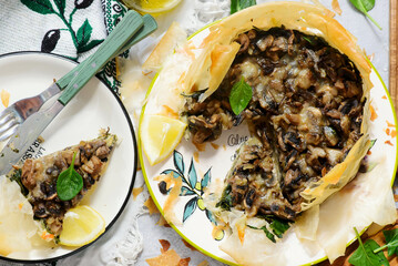 Filo pastry tart with mushrooms, cheese, and spinach .top veiw