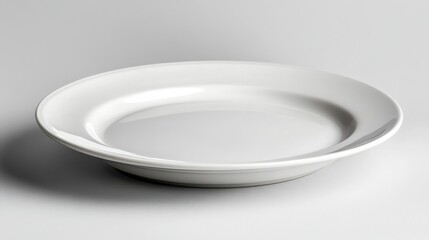 Spaghetti on White Plate, a close-up view of a plate of spaghetti elegantly presented on a pristine white table setting