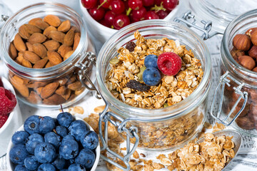 healthy banana granola and breakfast ingredients, top view