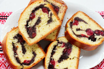 Yeast roll with poppy seeds and cherrie.top veiw