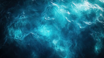 Deep ocean water surface texture.  Vastness of blue waves.  Turquoise highlights.  Ocean depth