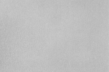 Dark grey paper texture with grain macro closeup