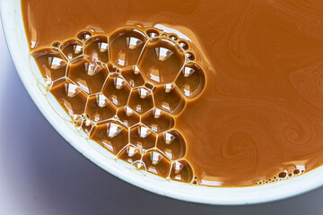 Macro coffee bubble texture,Coffee cream texture of fragrant  coffee background bubbles with foam. macro coffee crema