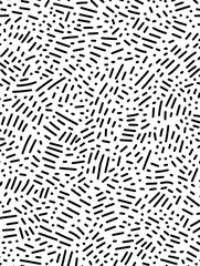 Abstract Pattern: A visually striking abstract pattern composed of a dense arrangement of short, irregular lines and dots, creating a dynamic and textured surface.