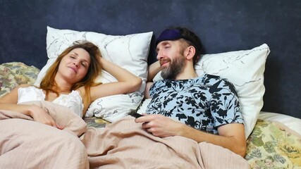 A beautiful woman forces sex on her husband but he is too tired for it