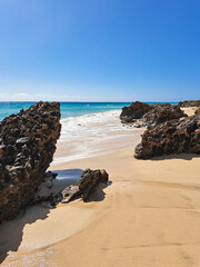 calm ocean waves and rocky coast in Fuerteventura, rock labyrinth