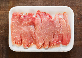 Package of uncooked pork loin stir fry strips