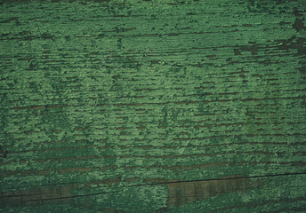 An old green wooden background. Close up.