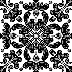 Intricate black pattern with symmetrical ornamental pattern in linocut style. Grunge texture tile shape. vector element