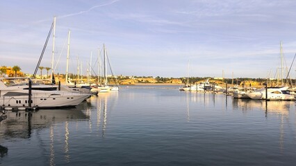 Fototapeta premium Coastal Lifestyle: Boats Lined Up at the Harbor