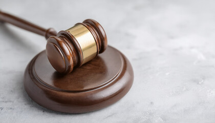 Obraz premium Wooden gavel on marble surface. Judge's hammer. Law and justice concept, constitution, courtroom