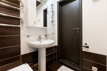 modern bathroom room with toilet and washing machine