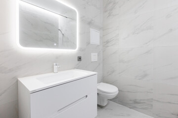 modern bathroom room with toilet and washing machine