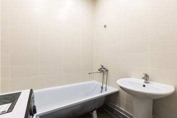 modern bathroom room with toilet and washing machine