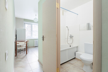 modern bathroom room with toilet and washing machine