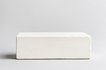 Modern Light Grey Concrete Block Against Neutral Backdrop