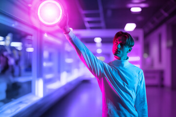 Futuristic Neon Cyberpunk Scene – Man in Sci-Fi Glow Holding Light Source
