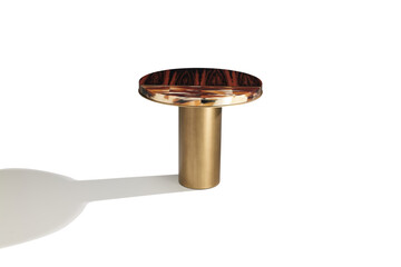 Fototapeta premium A modern, minimalist round side table with a sleek design isolated on White + clipping path. The table casts a distinct shadow on the white background.
