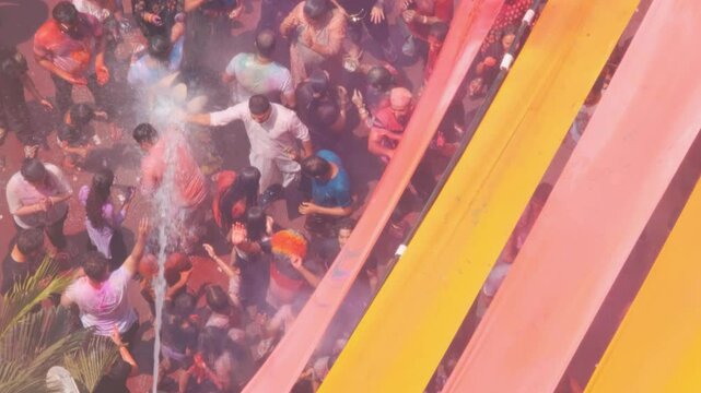 People enjoying a holi party, playing with water, getting refreshed 