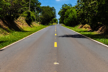 Empty asphalt roadway in rural area in Brazil